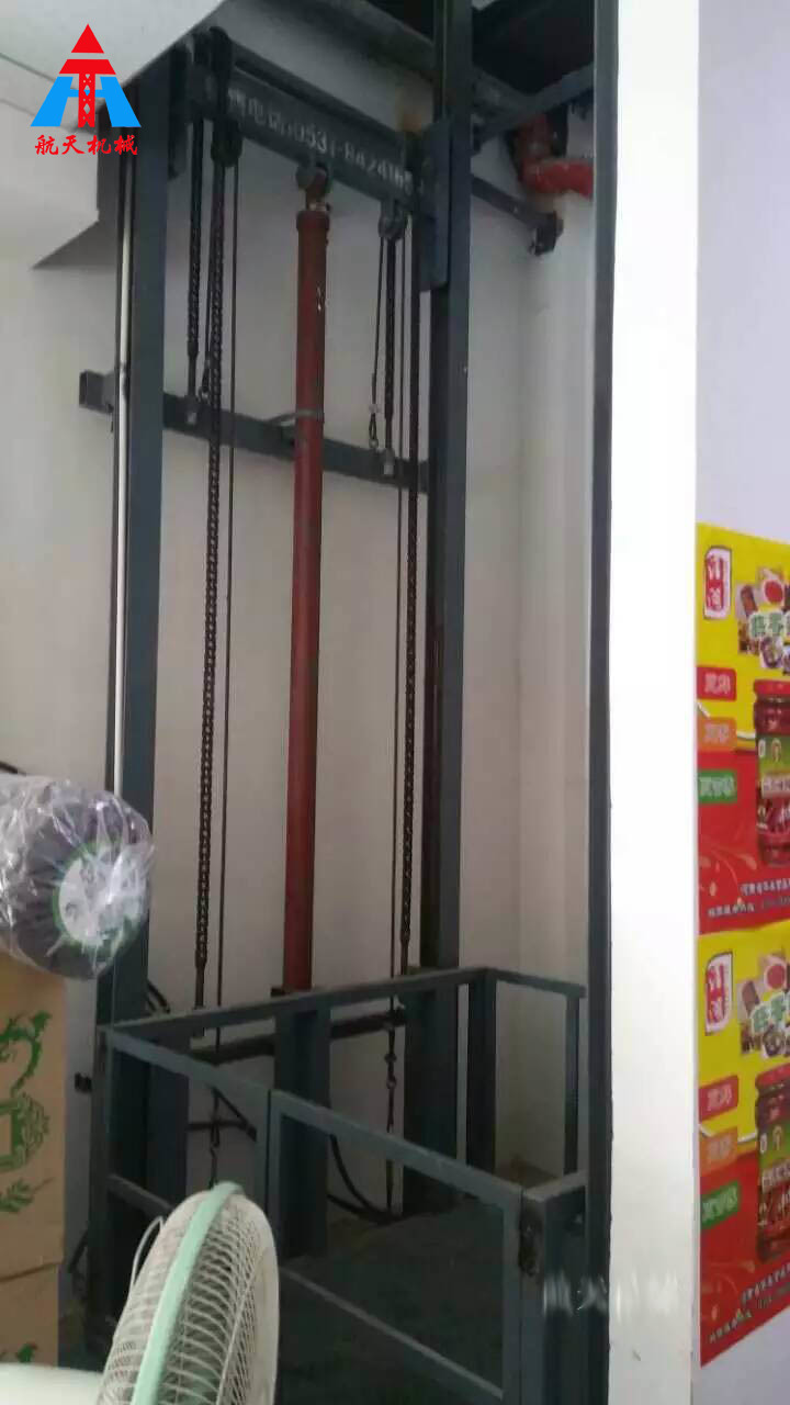 安徽阜阳食品店室内1吨导轨式升降平台交付使用